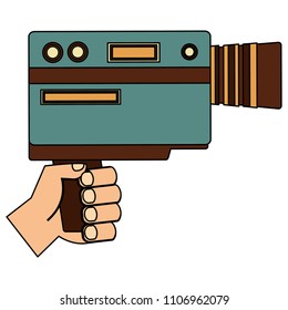 hand with retro handy camera isolated icon