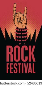 Hand in rock n roll sign and an inscription rock festival