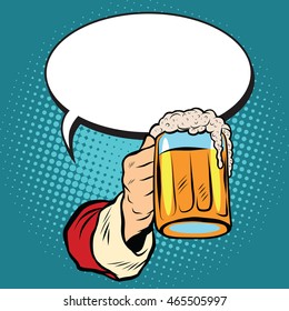 Hand of Santa Claus with a beer, pop art retro vector illustration. Holidays Christmas and New Year