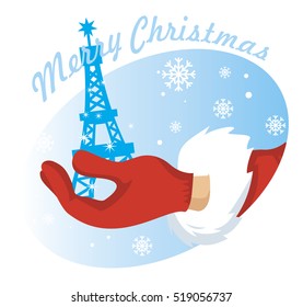 hand Santa with Eiffel tower on background of snowflakes
