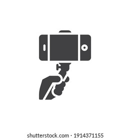 Hand with selfie stick vector icon. filled flat sign for mobile concept and web design. Taking selfie photo on mobile phone glyph icon. Symbol, logo illustration. Vector graphics