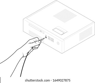 Hand servicing IT equipment: plugging in a 3.5mm audio cable.