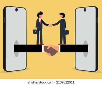 Hand shake and contract business. Business people shake hands through the phone screen,The concept of business communications.