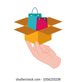 hand with shoping bag inside box package