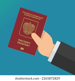 Hand showing Russian passport with eagle emblem and inscription passport and wording Russian Federation