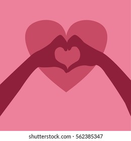Hand showing shape of heart