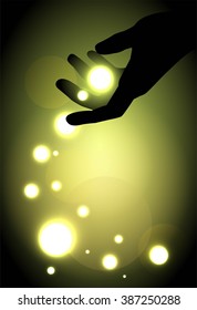 hand silhouette and balls of light