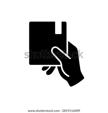 Hand silhouette holding a floppy disk or storage card.