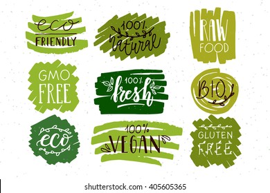 Hand sketched badges and labels with vegetarian, vegan, raw, eco, bio, natural, fresh, gluten and GMO free food design. Organic elements set for cafe, restaurant, food, drinks. Farmer market concept. 