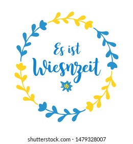 Hand sketched Es ist Wiesnzeit quote in German with floral blue yellow wreath and edelweiss. Isolated on white background. Drawn Oktoberfest lettering typography, Wiesn vector illustration