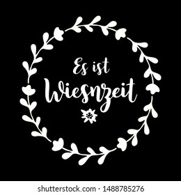 Hand sketched „ Es ist Wiesnzeit “ quote in German with floral wreath, translated " It´s  beer festival time". Isolated on black background. Drawn Oktoberfest lettering typography, vector illustration