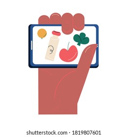 Hand with smartphome choosing and ordering delivery of food products online