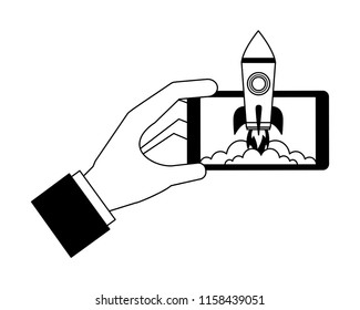 hand and smartphone with startup rocket