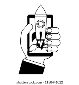 hand and smartphone with startup rocket