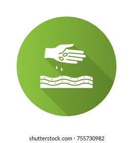 Hand sowing seeds flat design long shadow glyph icon. Agriculture. Vector silhouette illustration