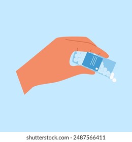 Hand spilling out  pills of the bottle. Medicine capsules fall out of the pill container
