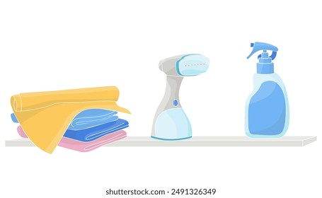 hand steamer, clean laundry and detergent on the shelf