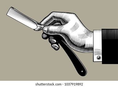 Hand with a straight razor. Vintage stylized drawing. Vector illustration