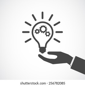 Hand Support Lightbulb With Gears Design Icon