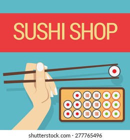 Hand with sushi roll