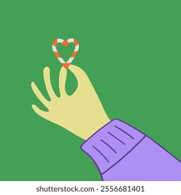 Hand in sweater is holding candy canes in heart shape. Love Christmas print vector illustration