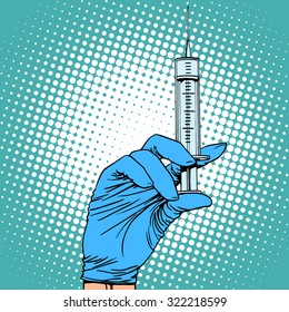 Hand with a syringe injection vaccination medicine pop art retro style