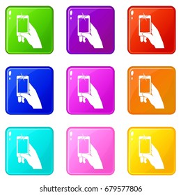 Hand taking pictures on cell phone icons of 9 color set isolated vector illustration