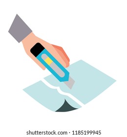 hand with the tool cutting a paper