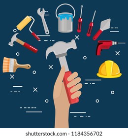 hand with tool and under construction equipment