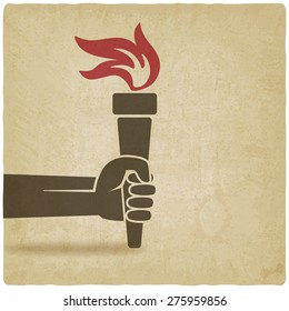 hand with torch symbol old background. vector illustration - eps 10