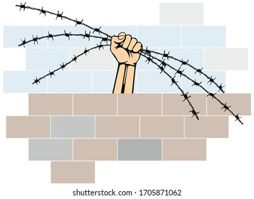 the hand tore the barbed wire on the brick wall