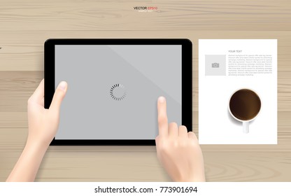 Hand touch screen digital tablet with spinner loading icon on wood background. Vector illustration.