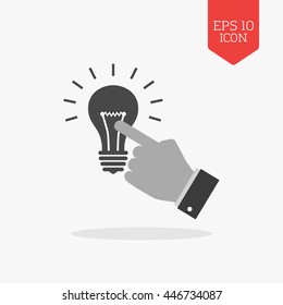 Hand touching light bulb icon, reach the idea concept. Flat design gray color symbol. Modern UI web navigation, sign. Illustration element