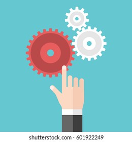 Hand touching red cog wheel and moving other white gears isolated on turquoise blue background. Cooperation, management, leadership and team work concept. Flat design. No transparency, no gradients