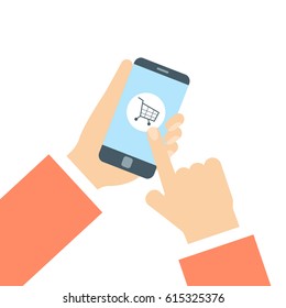 Hand touching shopping cart icon on phone screen. Online shopping concept