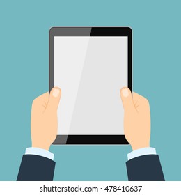 Hand touching tablet. White tablet with blank template screen.