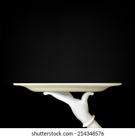 hand with a tray on a black background