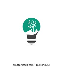 Hand tree and bulb logo design. Beauty salon or yoga logo.	