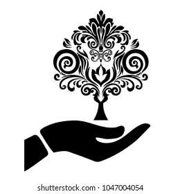 hand with a tree vector