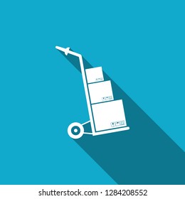 Hand truck and boxes icon isolated with long shadow. Dolly symbol. Flat design. Vector Illustration