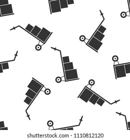 Hand truck and boxes icon seamless pattern on white background. Dolly symbol. Flat design. Vector Illustration