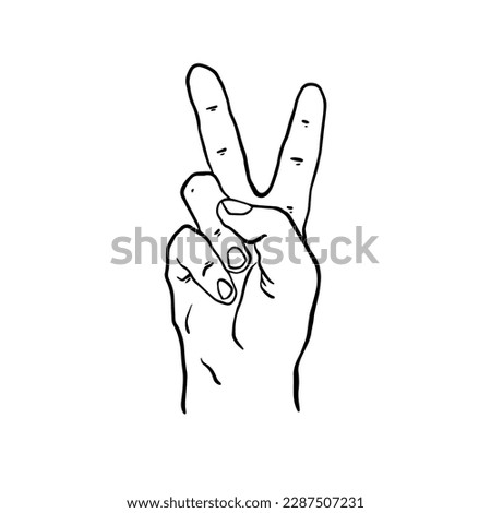 Hand with two fingers up. Peace gesture. The hand shows two fingers raised up