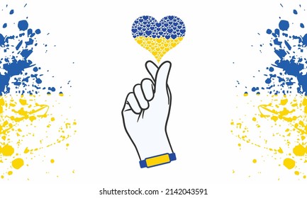 Hand with Ukraine flag in heart shape. Stay with Ukraine concept. Support for Ukraine. Heart shape Ukraine national flag color.