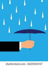 Hand with Umbrella in the Rain. Business protection idea, bad weather and raining day