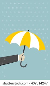 Hand with umbrella rain protection