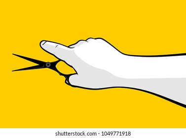 Hand using barber scissors 