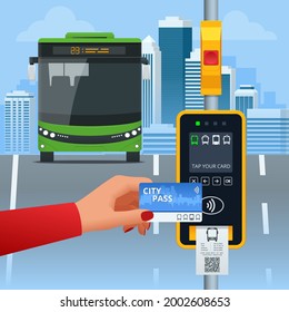 Hand using paper smart card ticket to pay money for transportation at payment kiosk stand. E-ticket paper for traveler. Yellow validator