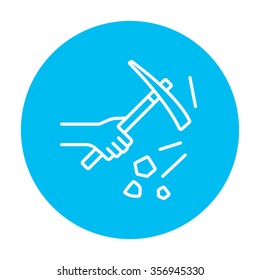 Hand using pickax line icon for web, mobile and infographics. Vector white icon on the light blue circle isolated on white background.