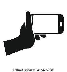 Hand is using a smartphone, potentially taking a picture, browsing the web, or sending a text