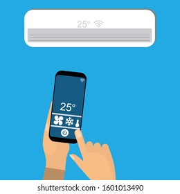 Hand using smartphone as a remote control for air conditioning